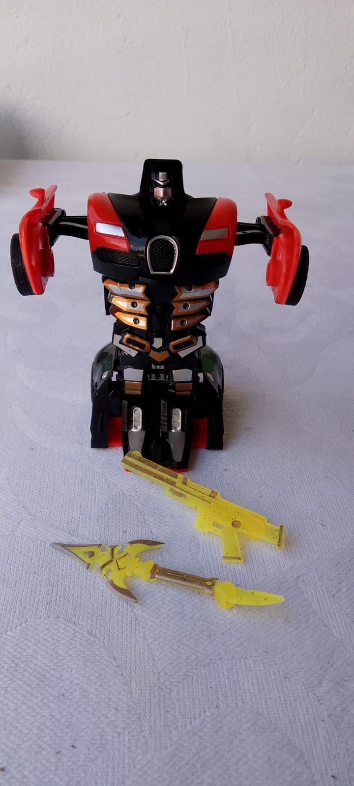 Carrinho que vira robô Deformation vermelho e preto